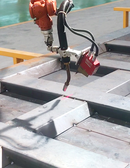 Seam Tracking System in Special Vehicles Box Plate Welding